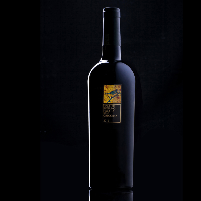 Bottle of red vine isolated on black still-life food photography photo7it